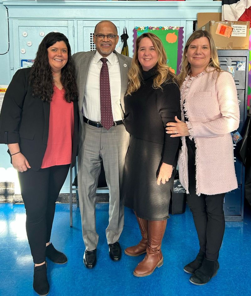 Principal Linda O'Shaughnessy with members of the PS 88Q community